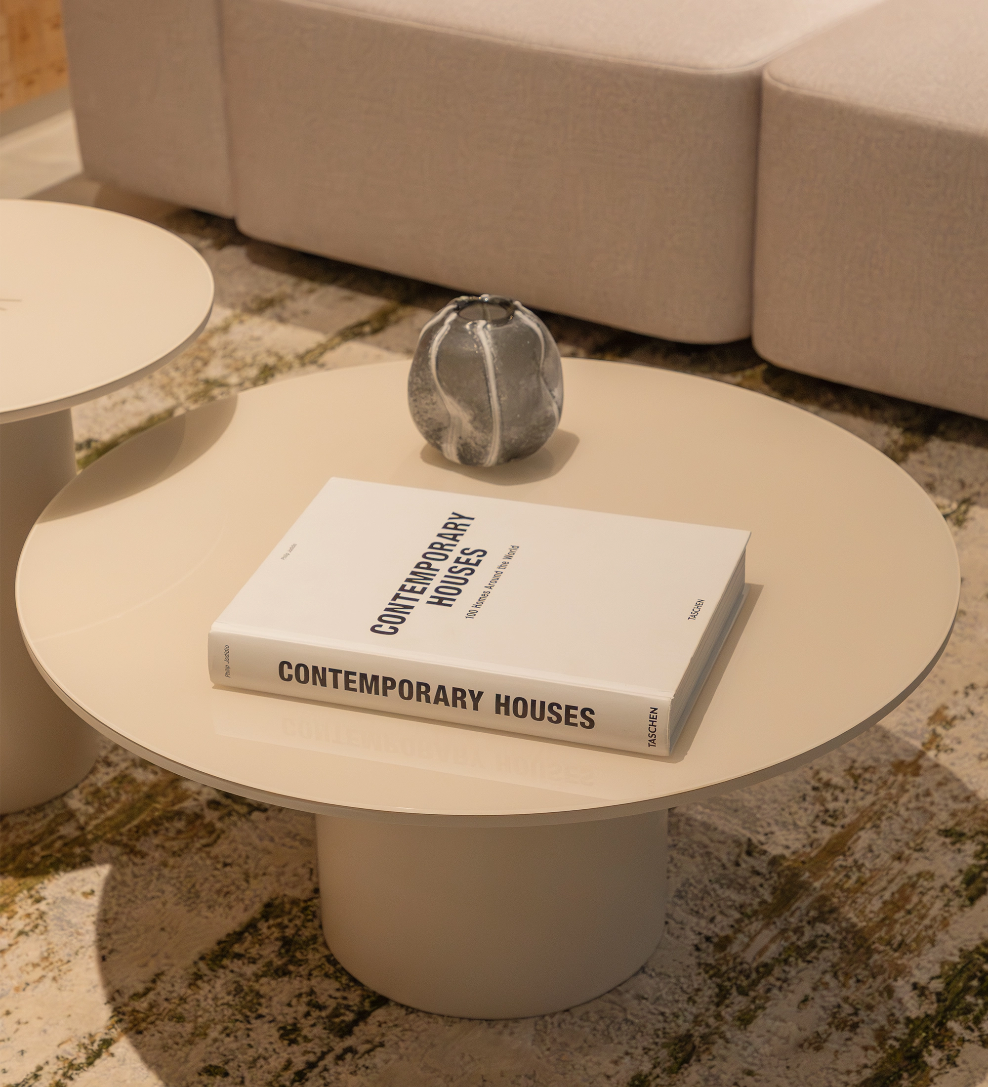 Paris Center Table with book titled 'Contemporary Houses' and small ceramic vase