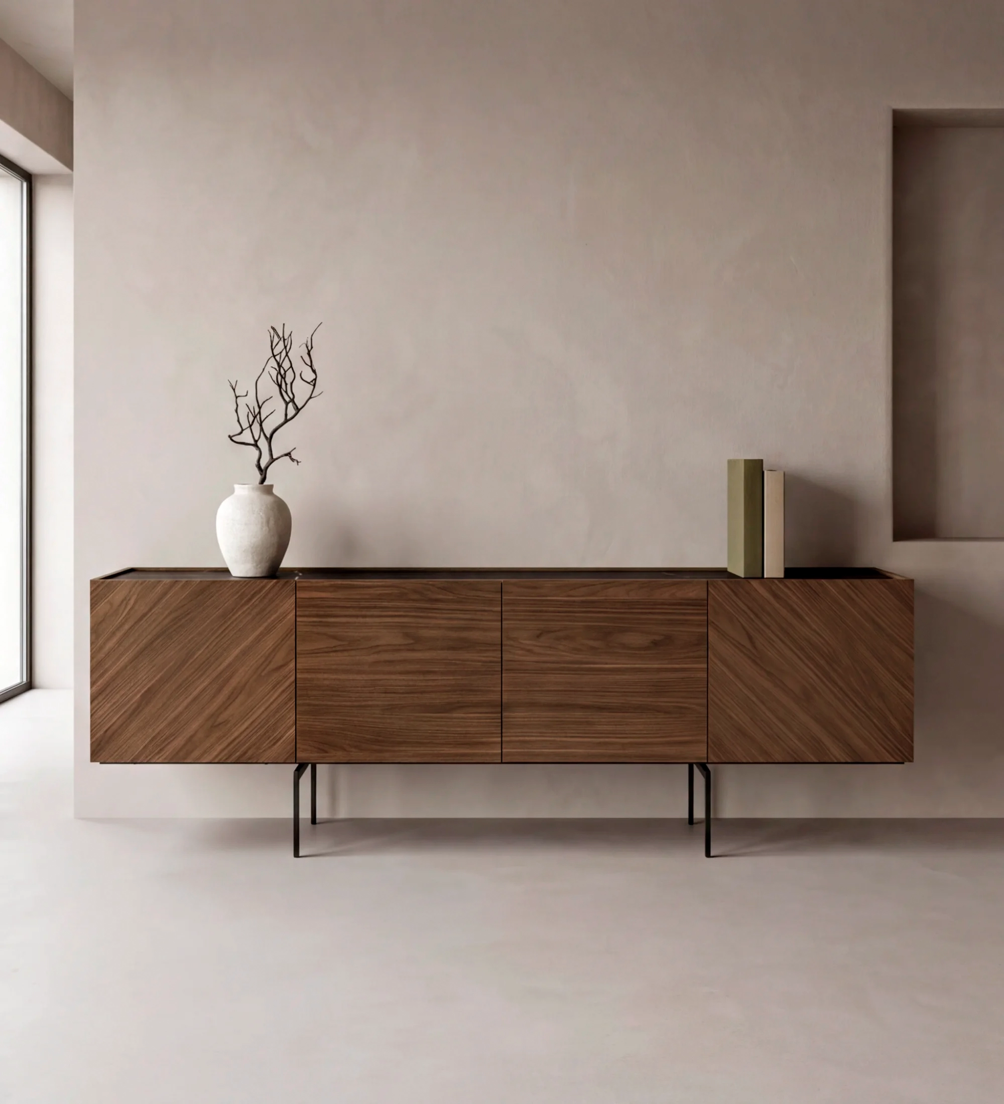 Lagos Sideboard in walnut with black metal legs, vase and books on top