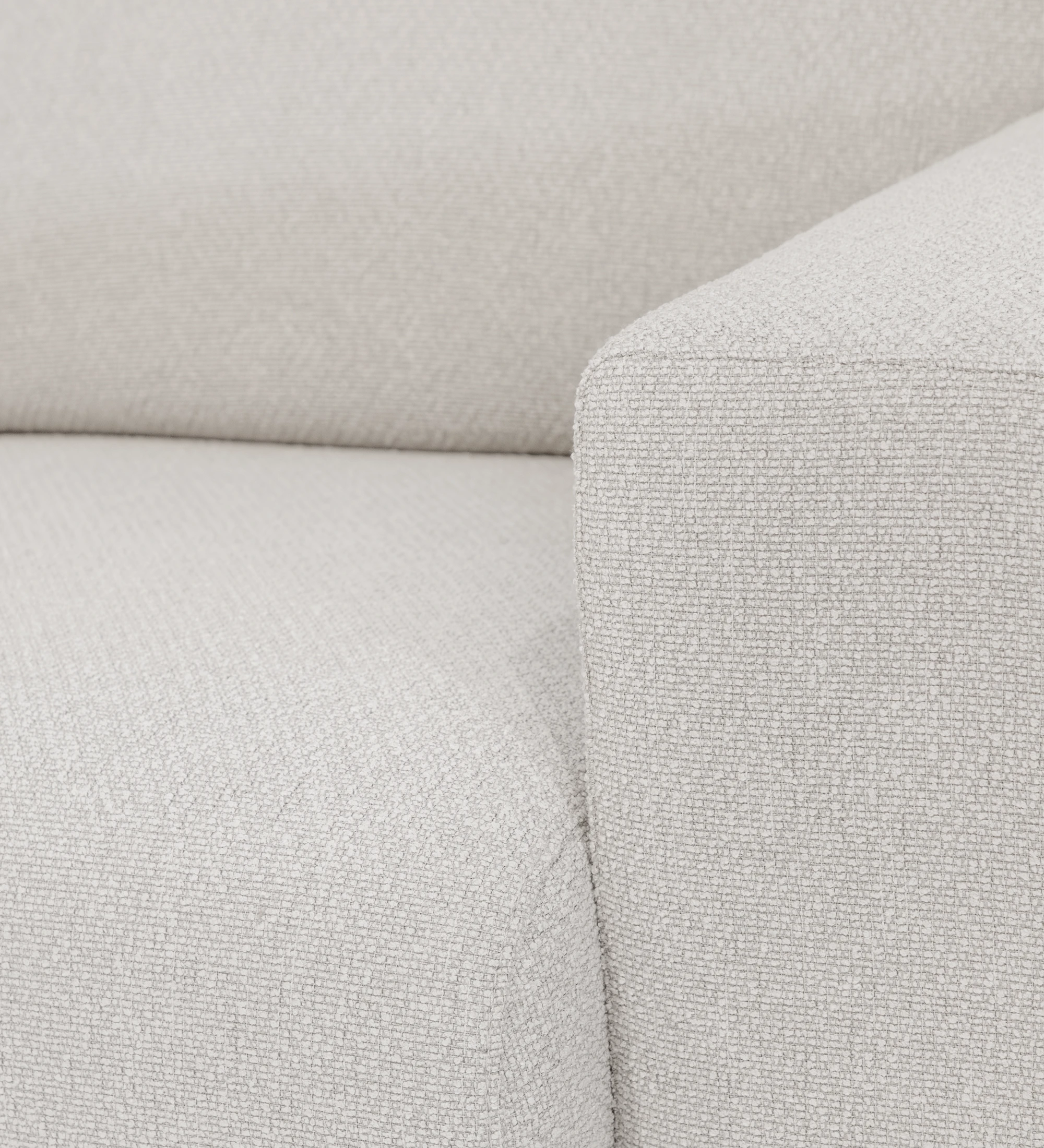 Canapé Lagos en tissu bouclé beige, accoudoir et assise en gros plan
