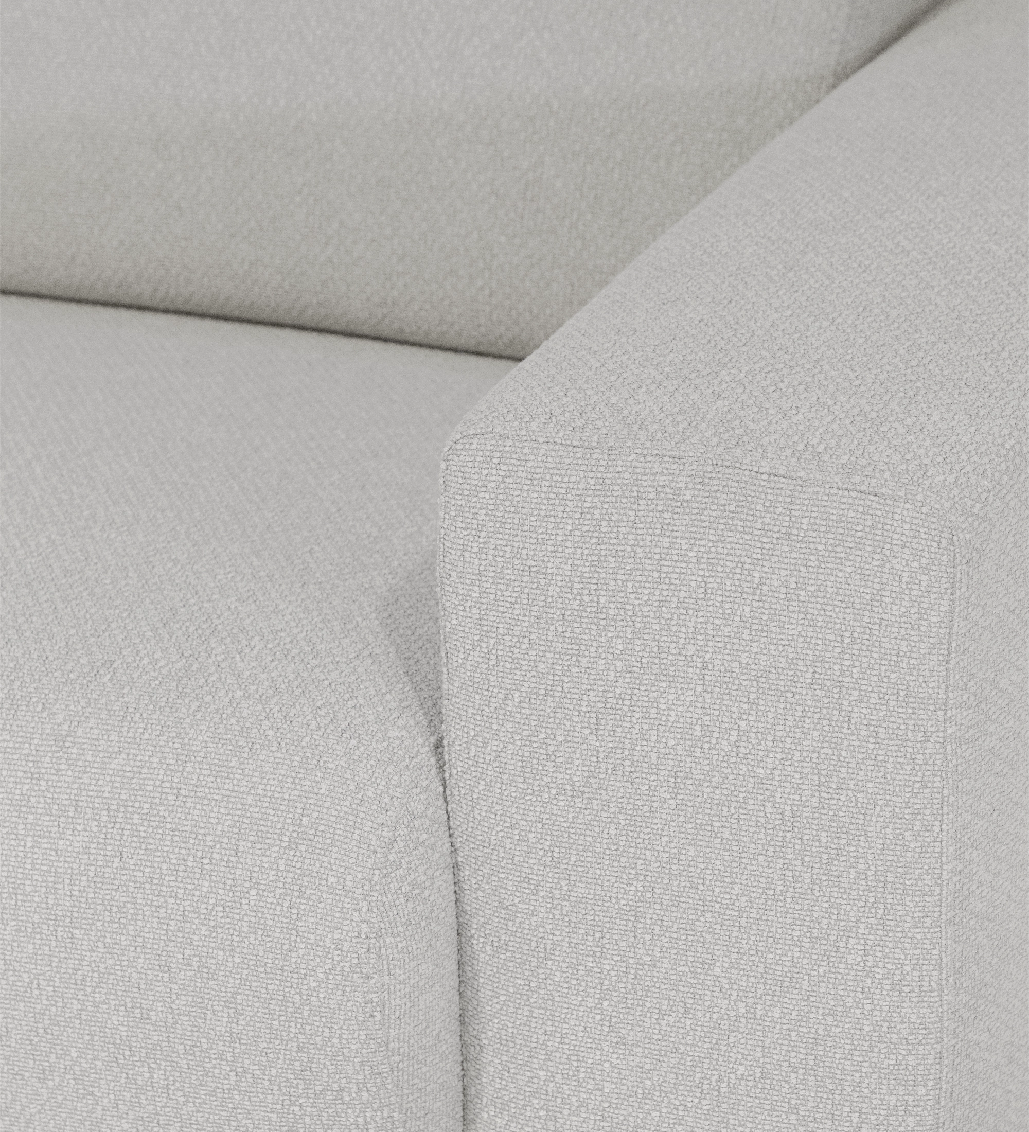 Canapé Lagos en tissu gris clair, gros plan sur l'accoudoir et l'assise