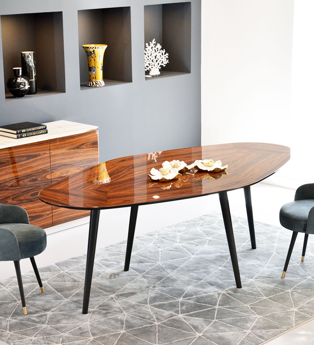 'Trapezoival' dining table with high gloss palissander top and black lacquered legs.
