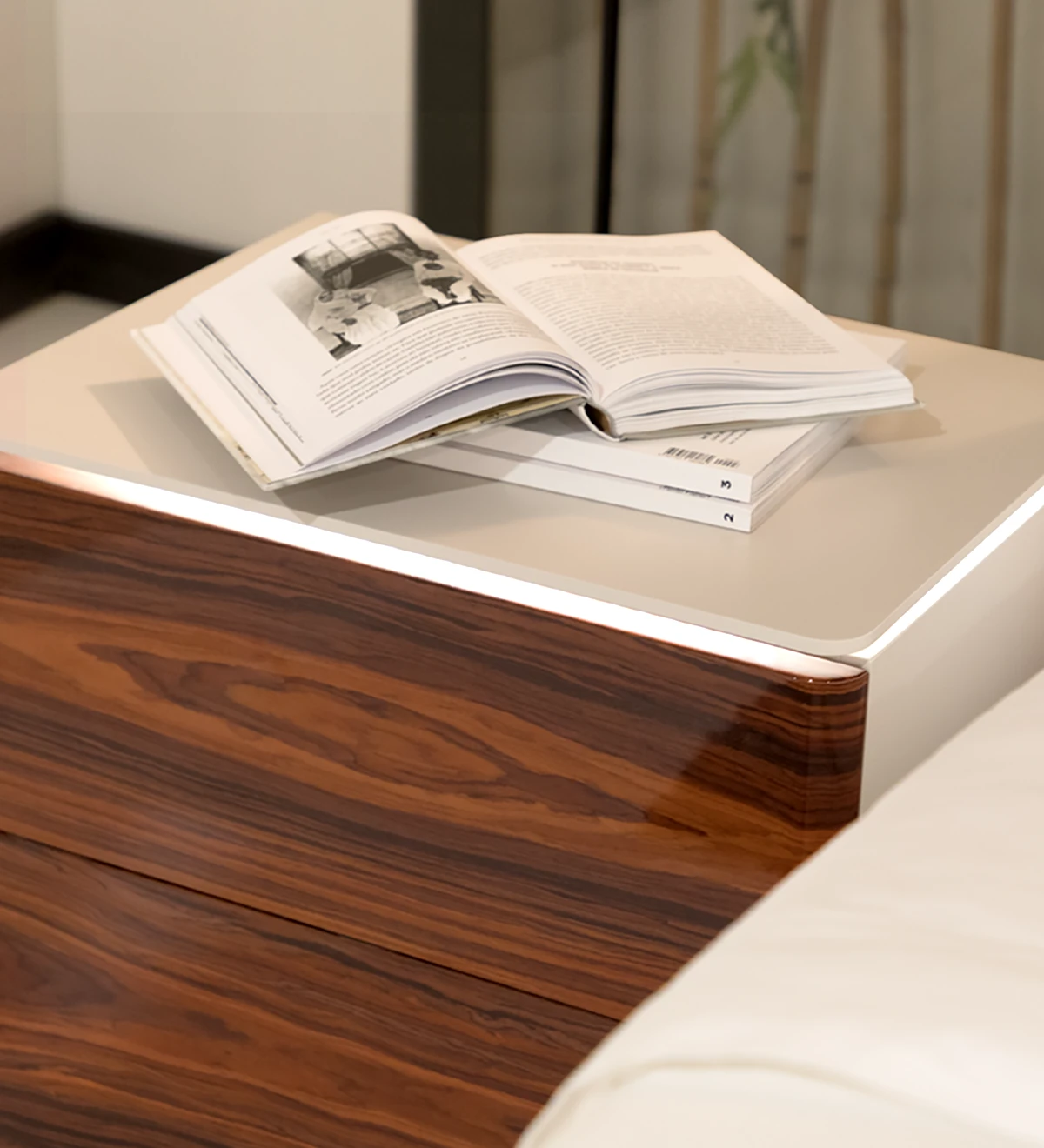 Bedside table with 2 drawers in high gloss palissander, pearl lacquered frame.