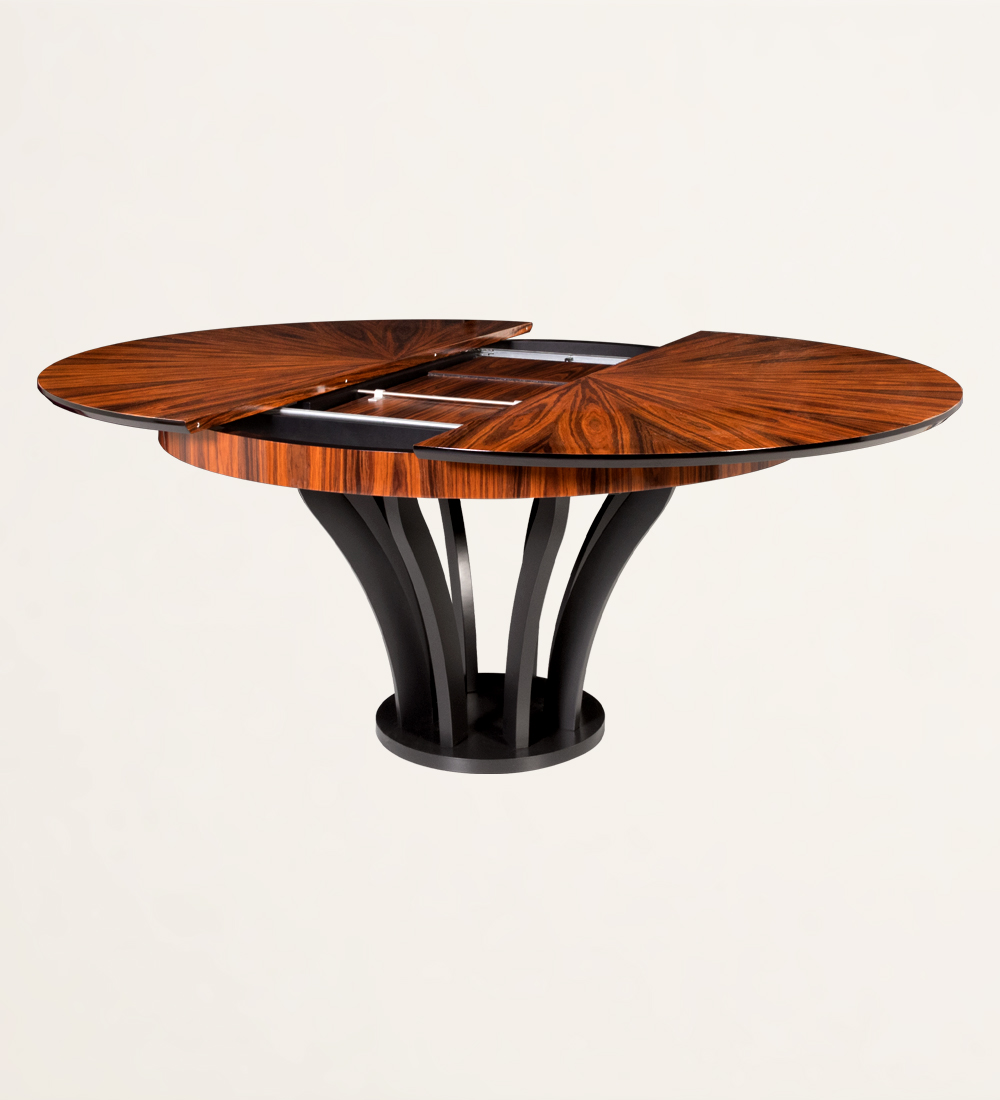 Table de repas ronde extensible avec plateau à pointes en palissandre brillant et pied laqué noir.