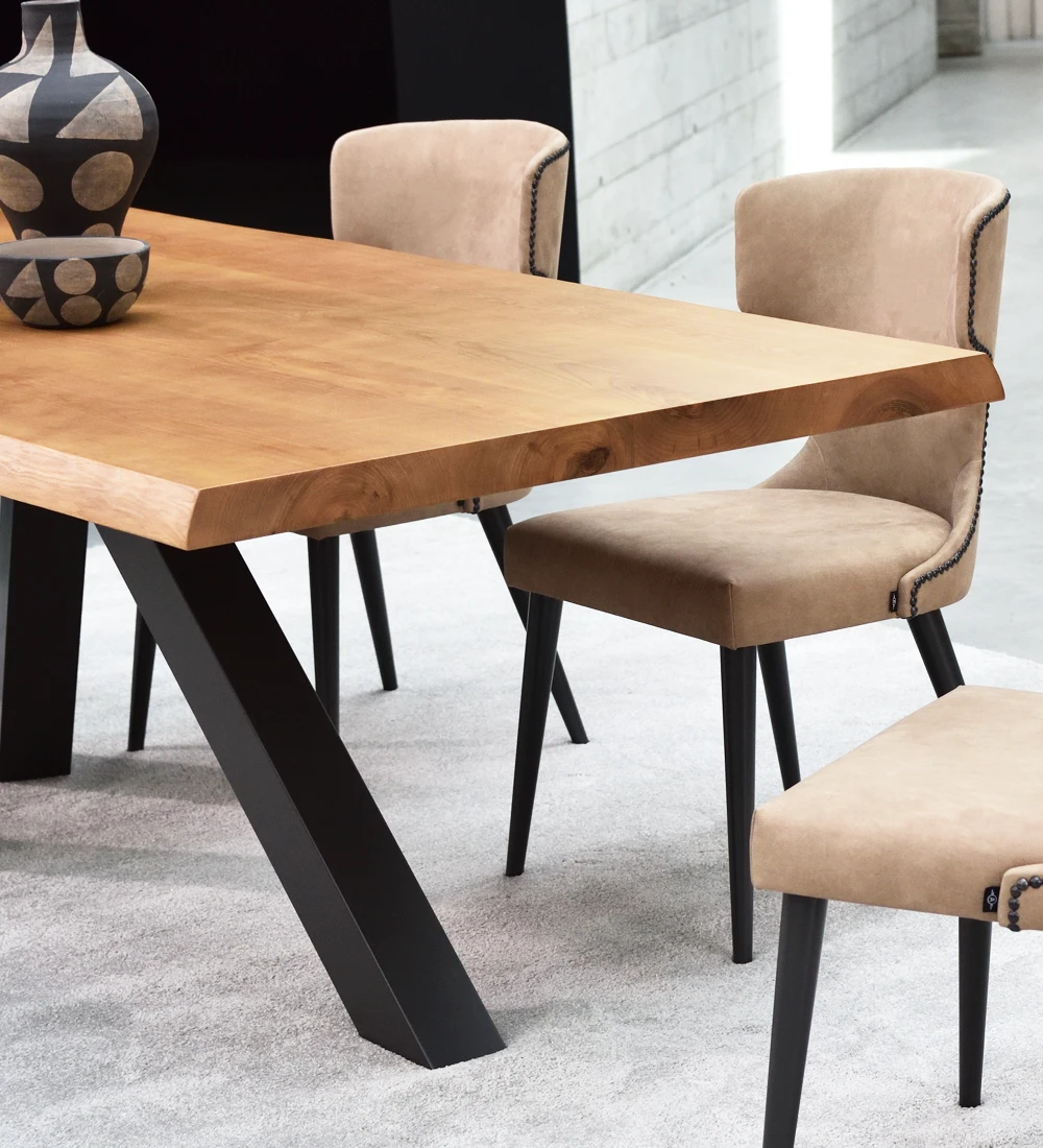 Rectangular dining table with ash wood top and anthracite lacquered metal legs.