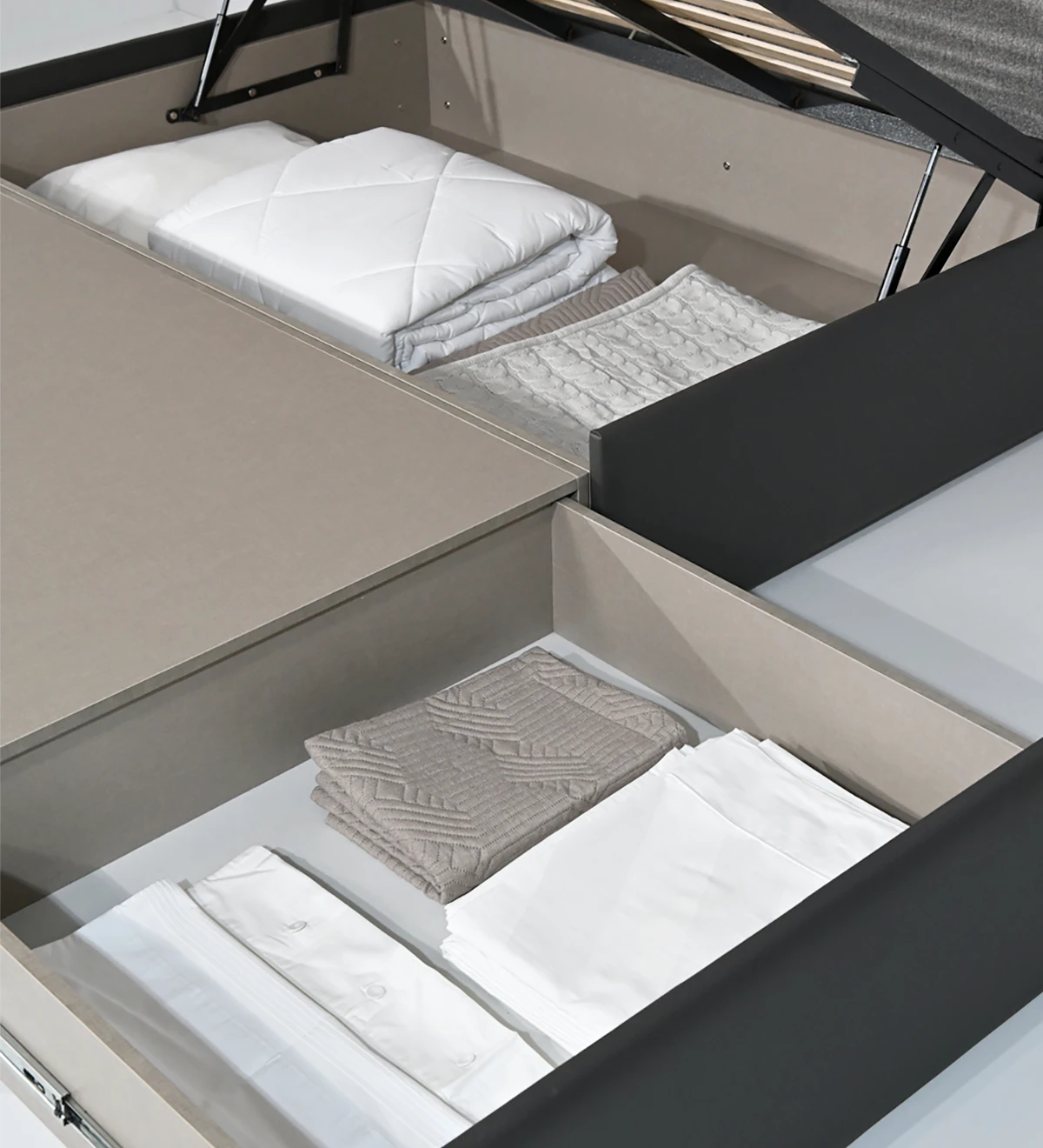 Double sommier upholstered in eco-leather, with lifting bed and 2 drawers for storage.