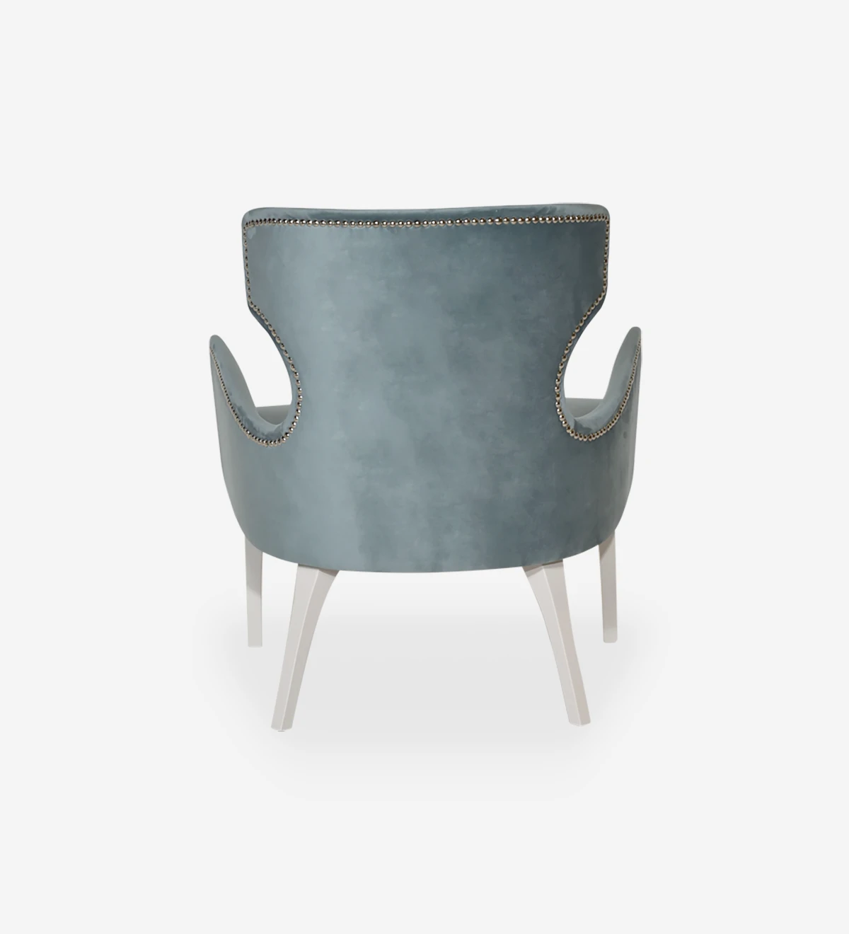 Armchair upholstered in fabric, with silver batting and pearl lacquered feet.