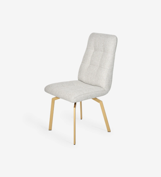 Fabric upholstered chair with gold lacquered metal feet.
