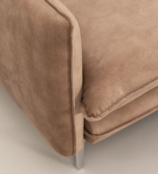 Maple upholstered in fabric, with metallic feet.