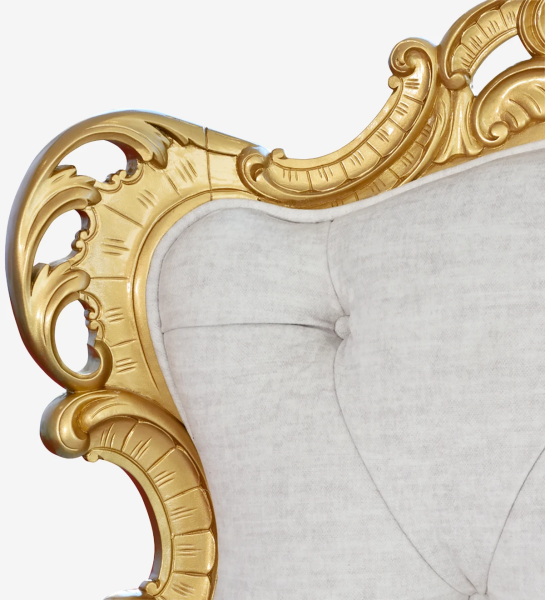 Armchair upholstered in fabric, golden lacquered structure.