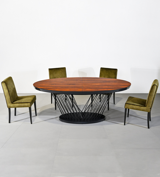 Oval extendable dining table with high gloss palissander top and black lacquered metal legs and base.