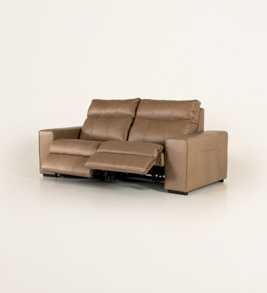 2 seater, upholstered in leather, with relax system.