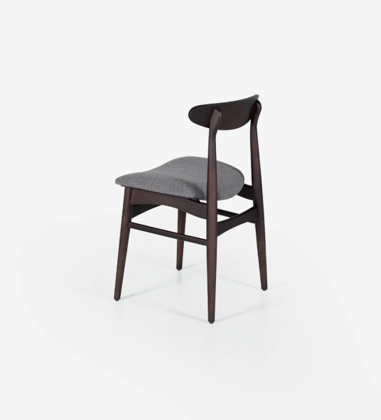 Chaise en bois de frêne couleur brun foncé avec assise recouverte de tissu.