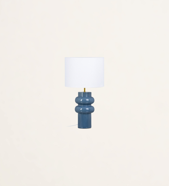 Blue ceramic table lamp with shade