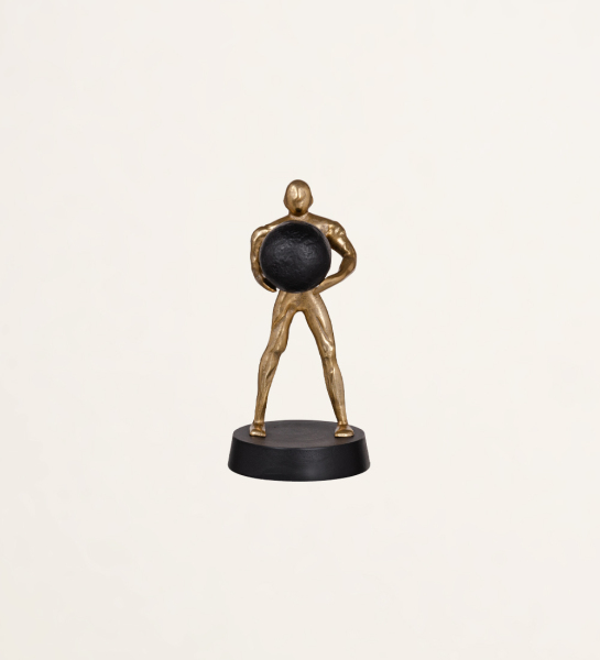 Sculpture man with ball in black and gold aluminum
