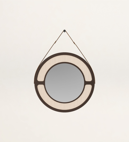 Miroir rond avec structure laquée brun foncé, détails en rotin. 