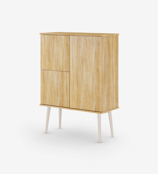 Cupboard with 3 doors and structure in natural color oak, feet lacquered in pearl.