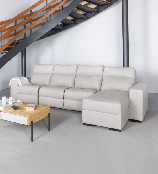 Sofá de 3 plazas con chaise longue tapizado en tejido, con sistema relax y almacenaje en la chaise longue.