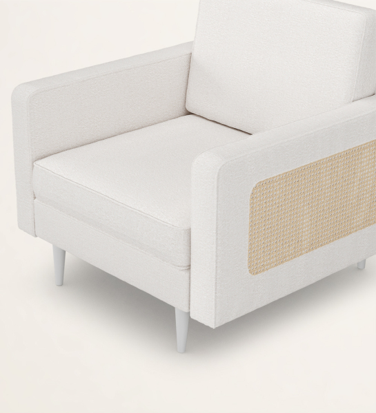 Maple upholstered in fabric, with rattan detail on the sides, with pearl lacquered feet.