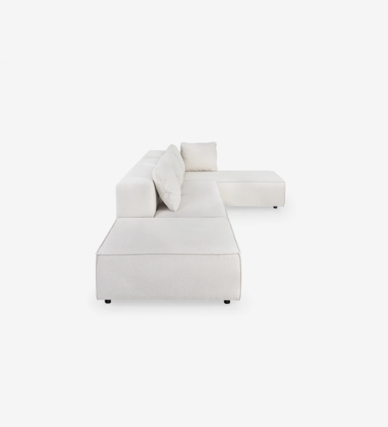 Sofá de esquina con chaise longue y puff, tapizado en tejido.