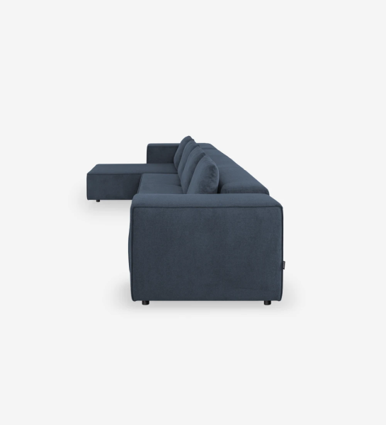 Canapé 3 places avec chaise longue, recouvert de tissu.