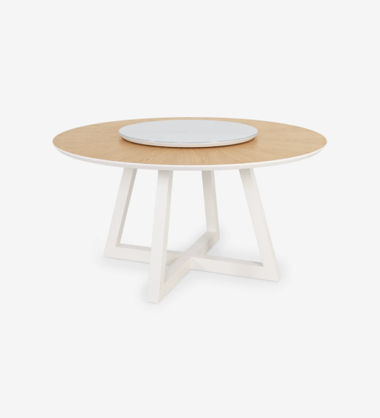 Round dining table with natural oak top, swivel top in glass inspired white Estremoz marble and pearl lacquered legs.