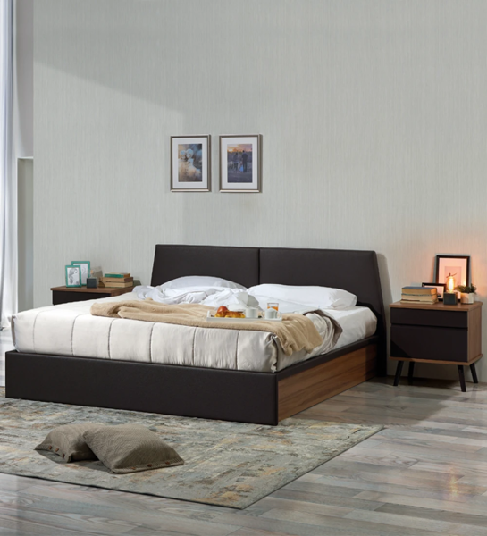 Double bed with headboard and footboard upholstered in dark brown eco-leather, walnut sides.