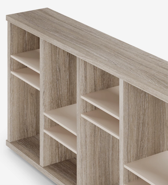 Horizontal bookcase in decapé oak with inner sides in pearl.