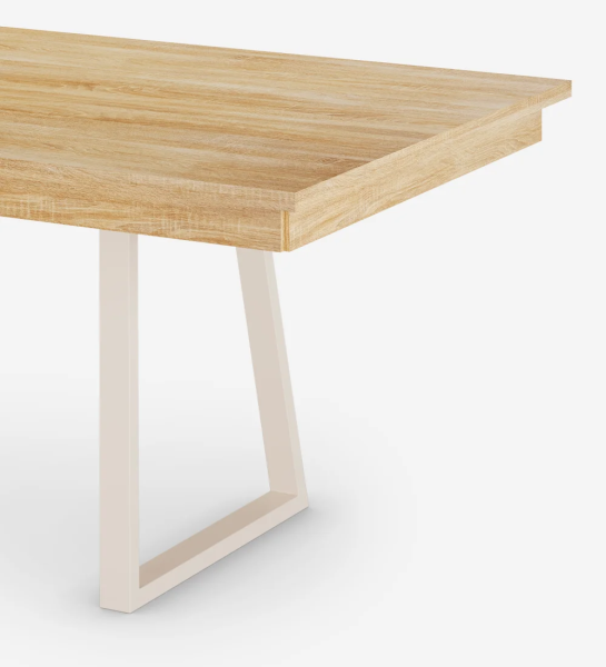 Rectangular extendable dining table with natural oak top and pearl lacquered metal feet.