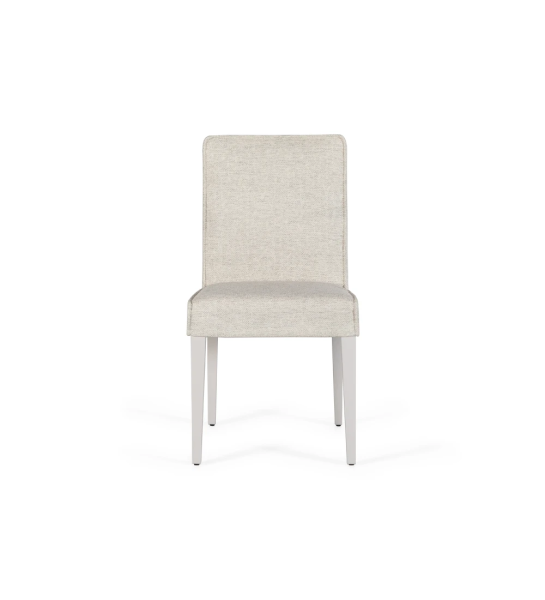 Chair upholstered in fabric, with feet lacquered in pearl.
