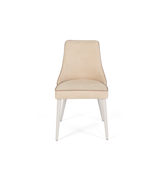 Fabric upholstered chair with pearl lacquered feet.