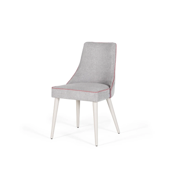 Fabric upholstered chair with pearl lacquered feet.