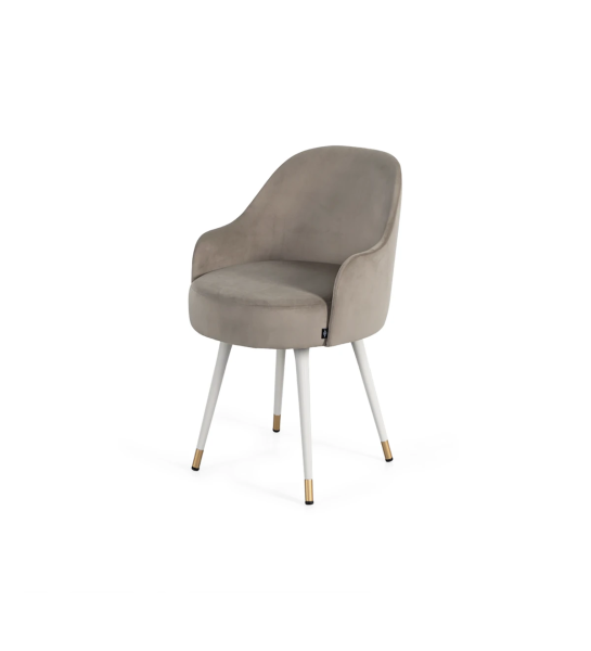 Fabric upholstered swivel chair with pearl lacquered feet and gold detailing.