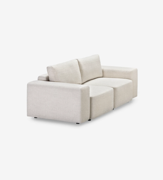 Canapé 2 places avec chaise longue, recouvert de tissu.