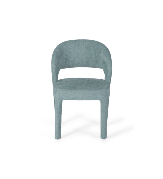 Chair upholstered in fabric.