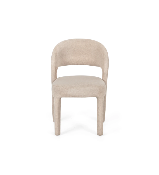 Chair upholstered in fabric.
