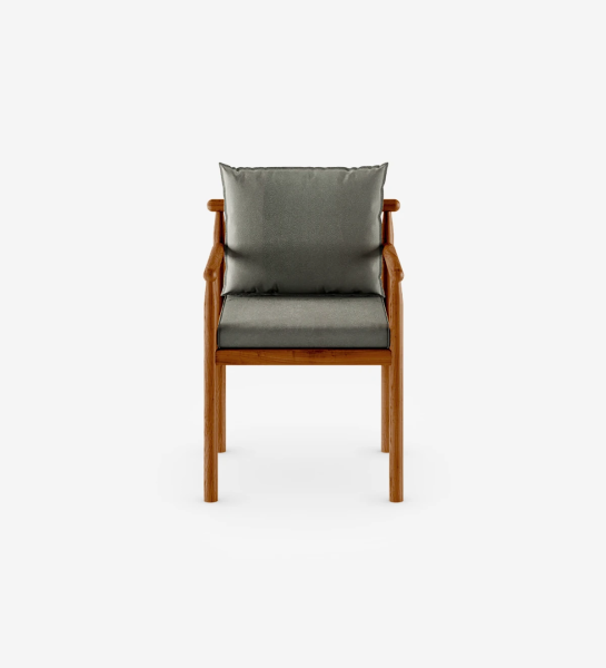 Chair with arms, fabric upholstered cushions, and structure in honey-colored natural wood.
