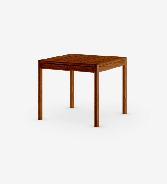 Square dining table in honey-colored natural wood.