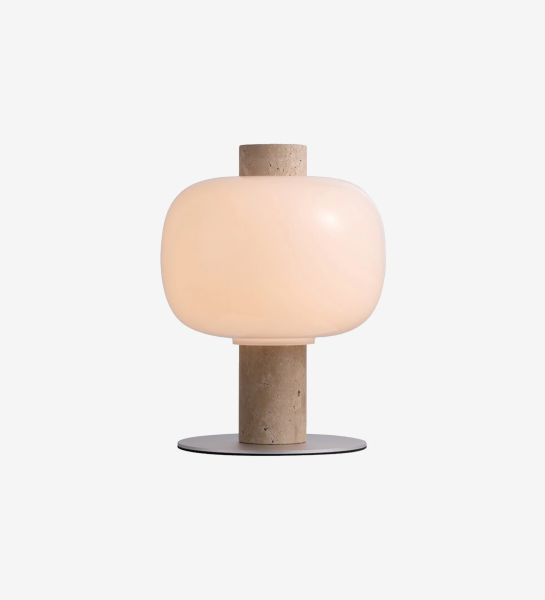 Table lamp with beige stone base and opal glass lampshade.