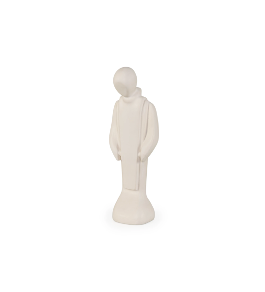 Escultura de cerâmica feita à mão, de tom cru matte.