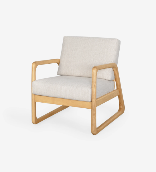 Antarte by AI Armchair upholstered in light gray fabric, structure in natural wood.