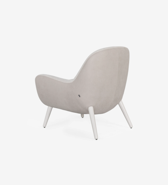 Oslo armchair upholstered in beige fabric,pearl lacquered feet.