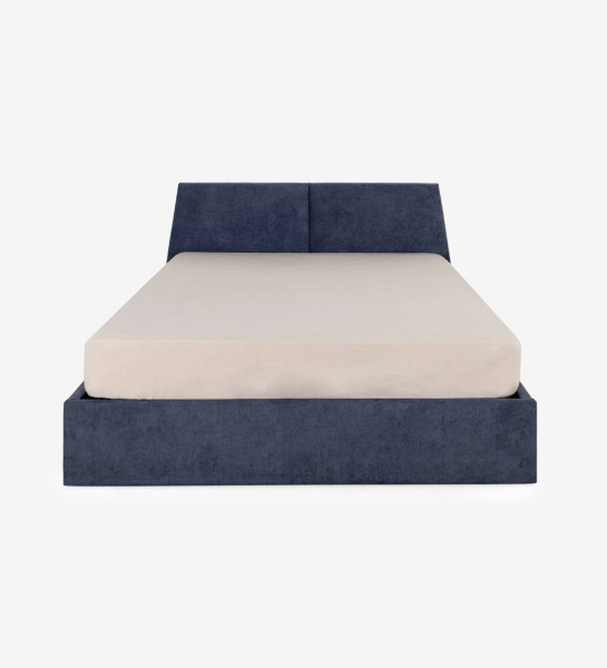 Lit double Oslo avec tête et pied de lit rembourré en tissu bleu, côtés en chêne naturel, rangement via plateforme élévatrice.