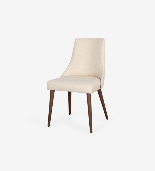 Oslo chair upholstered in beige fabric and and walnut wood legs.