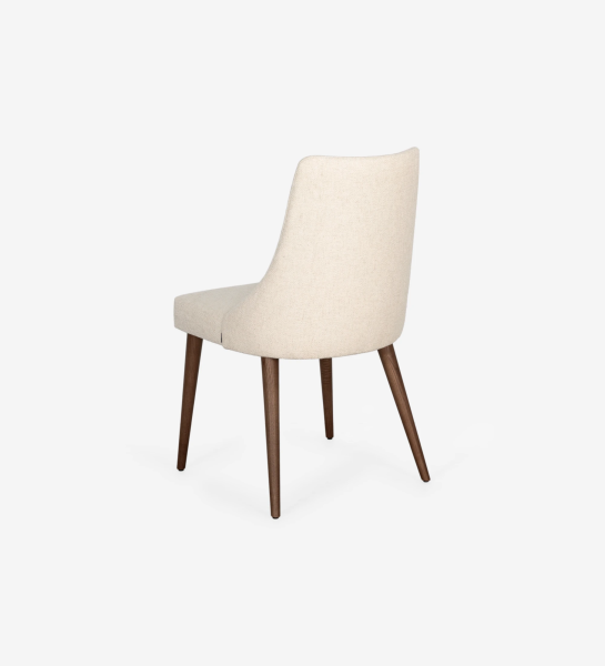 Oslo chair upholstered in beige fabric and and walnut wood legs.