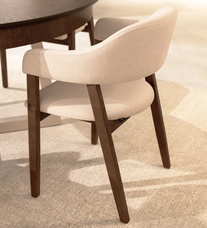 Chair with arms, in walnut-colored ash wood, with seat and back upholstered in fabric