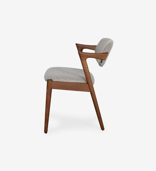 Chair in walnut-colored ash wood, with seat and back upholstered in fabric.