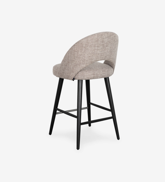 Stool with fabric upholstered, with black lacquered feet and stainless steel footrest.