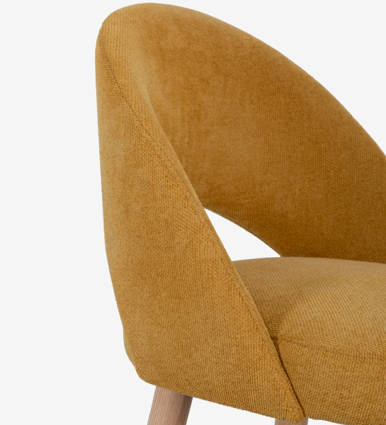 Stool upholstered in yellow fabric, with natural colored wooden legs.
