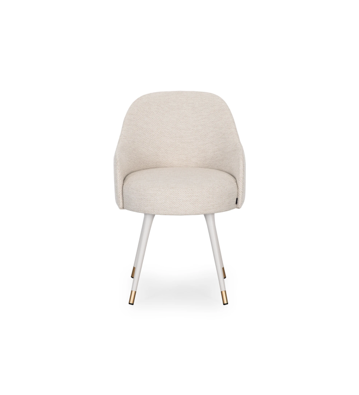 Beige fabric upholstered swivel chair with pearl lacquered feet and gold detailing.