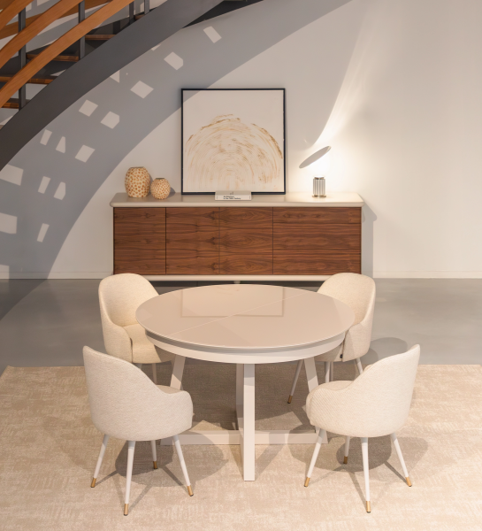 Round extendable dining table in pearl lacquer with glass top and pearl lacquer extension.
